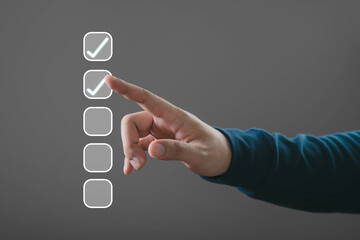 A hand interacting with checkboxes, symbolizing task completion and organization in a digital interface.