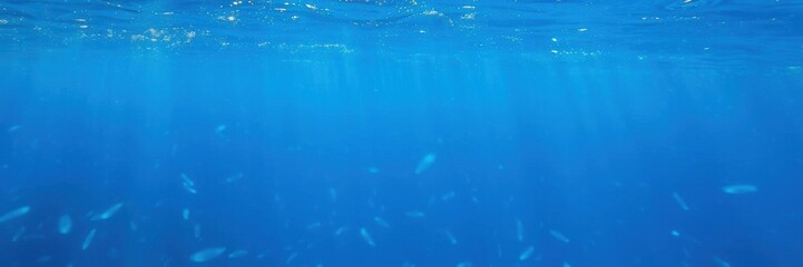 Flowing ripples of deep blue water creating a beautiful textured pattern, shimmering, deep