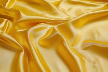 Obraz premium Smooth Golden Satin Fabric Texture Background