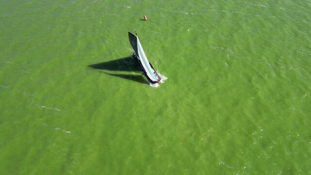 Traditional, flat-bottomed Frisian sailing ships in a yearly competition on the Ijsselmeer, The Netherlands