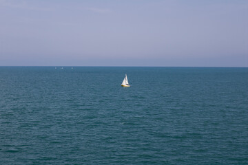 Sailboat on the sea of Antibes coast. French Riviera.