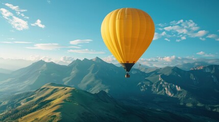 Naklejka premium Yellow hot air balloon is floating in the air above scenic mountains on sunny day. Ballooning in mountains, recreational adventure