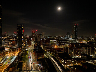 Obraz premium city views at dusk with the moon