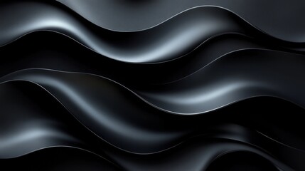 Fototapeta premium Abstract waves of black material creating a smooth, flowing texture.