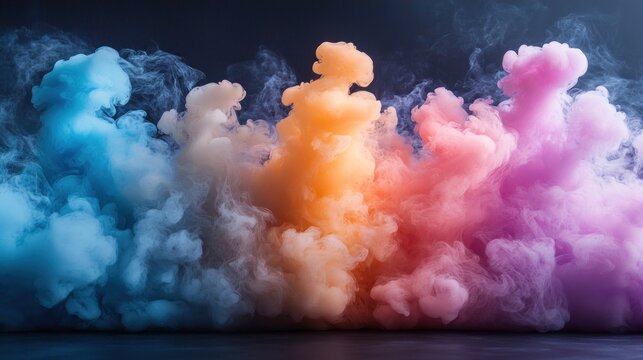 Colorful smoke clouds on dark background.