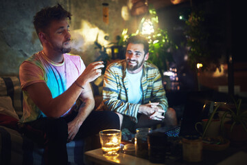 Happy, friends and men with weed or joint for smoking habit, thc herbs and drugs at night. Smoker,...