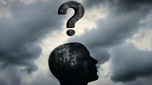 Silhouette of a human head with a large question mark against a cloudy sky, symbolizing thought and uncertainty 4K video
