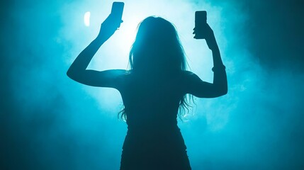 Capturing the Moment: A Silhouette Embracing Technology in a Lively Concert Atmosphere