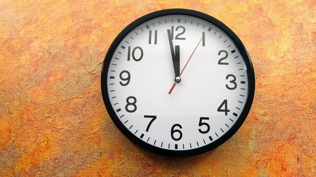 Time lapse of a clock reversing after midnight 