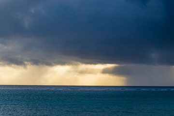 Dramatic Storm Clouds Over a Calm Ocean, Mauritius