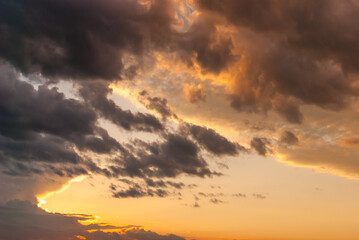 Fototapeta premium Colorful colors of sunset: a stunning mixture of warm and cold tones of the sunset and the evening sky