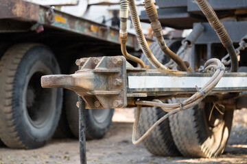 Industrial equipment connection construction site close-up urban environment ground level mechanic concept
