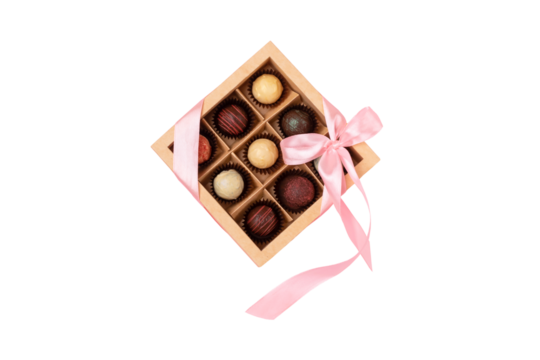 Elegant box of chocolates tied with a pink ribbon