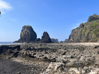 Scenic Coastal Rock Formations on a Clear Blue Day