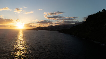 Scenic Coastal Sunset with Vibrant Sky and Calm Ocean