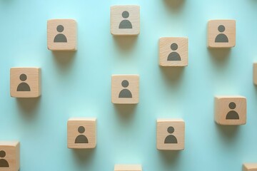 Obraz premium Unity Concept - Simple Wooden Blocks with Human Symbols on Blue Background