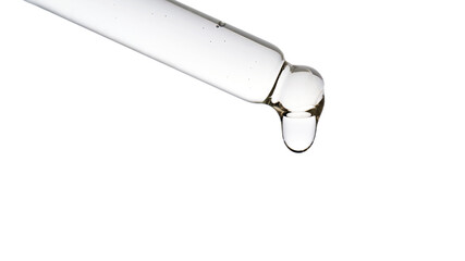 Dropper pipette with delicious serum with bubbles close-up.
