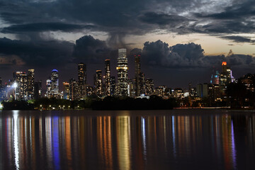 stunning Melbourne skyline while sunset reflected in the Albert Park Lake, Melbourne, Australia