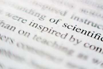 Macro Shot of the Word Inspired on a Book Page