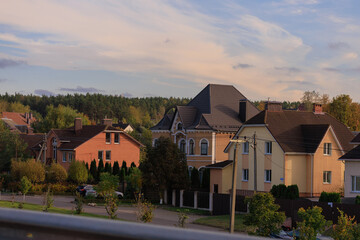 Fototapeta premium Road shoulder on a sunny autumn day. Views of the landscape from the car window.