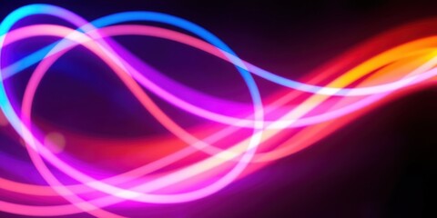 Obraz premium Abstract Light Trails in Vibrant Hues A Symphony of Color and Movement