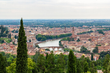 a beautiful, stunning unique panoramic view from the top of the Santuario della Madonna di Lourdes church at a steep hill in Verona, italy
