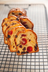 Fruit cake dessert sweet dried fruit traditional pastry, nuts meal food snack on the table copy space food background rustic top view