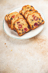 Fruit cake dessert sweet dried fruit traditional pastry, nuts meal food snack on the table copy space food background rustic top view