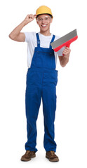 Young decorator with putty knife on white background