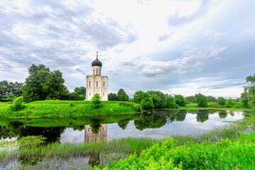 Church of Intercession upon Nerl River 12th century. (Bogolyubovo, Vladimir region, Golden Ring of Russia) A warm summer evening. historical and cultural heritage of Russia.