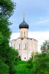 Church of Intercession upon Nerl River 12th century. (Bogolyubovo, Vladimir region, Golden Ring of Russia) A warm summer evening. historical and cultural heritage of Russia.