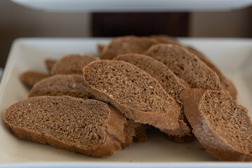 Multigrain whole wheat brown bread slices on a tray