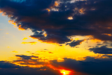 Evening sky with ominous black clouds. Night approaches, the sky is filled with dark, brooding...