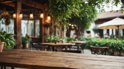 Fototapeta premium A tranquil outdoor dining setting with wooden tables under lush greenery in the evening