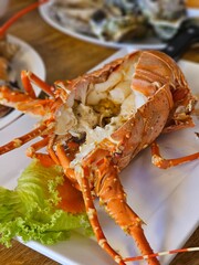 Lobster feast preparation coastal restaurant food photography casual dining close-up view culinary delight