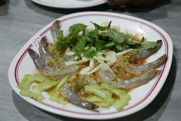 Fresh shrimp dish local seafood restaurant culinary delight indoor dining close-up view gastronomic experience