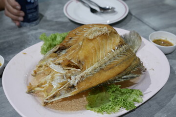 Fried fish dish local restaurant food photography casual dining close-up culinary delight