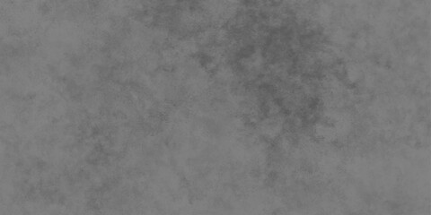 Obraz premium Closeup of a Rough Cement Wall in Neutral Gray and black Shades. Urban Grunge Material with Cracks, Plaster, and Retro Paint for Design Project.