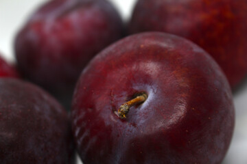 plums with selective focus. set of plums. group of plums. details of fruits. set of fruits.