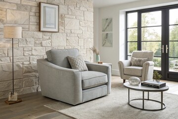 Fototapeta premium Grey snuggle chair against stucco wall. Home interior design of modern living room.