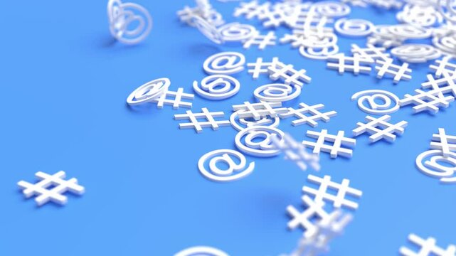 internet signs hashtag and email symbols falling in slow motion 3d animation background. Can be used to represent social media marketing content, influencer advertisement or online address