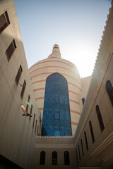 The Spiral Mosque at the Kassem Darwish Fakhroo Islamic Centre in Doha, Qatar, is an architectural marvel known for its unique spiral design and modern Islamic aesthetics.