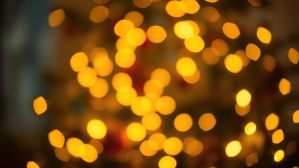 Obraz premium Blurred shiny lights on a christmas tree, shimmering effects, christmas tree, snowy backdrop