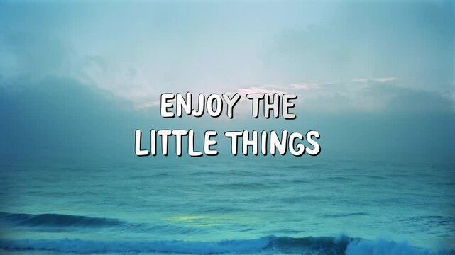 Animated white text reading "Enjoy The Little Things" floats over a calm, blue ocean scene. This uplifting quote is perfect for mindfulness, travel, or lifestyle content.