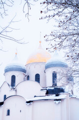 Veliky Novgorod Russia. St Sophia Cathedral, closeup of domes, Veliky Novgorod, Russia. Focus at the cathedral, winter day view