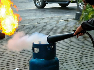 Practice extinguishing fires using a fire extinguisher.