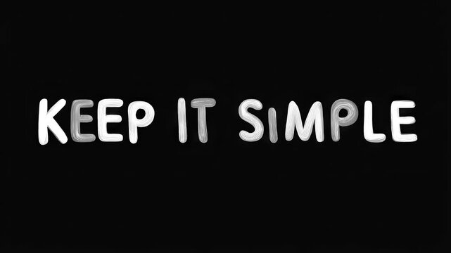 Positive motivational phrase &ldquo;Keep it simple &rdquo; white frase on black background