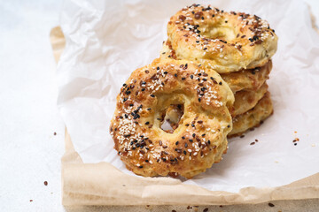 Homemade bagels with sesame, poppy, cottage cheese, cheese. Healthy food.