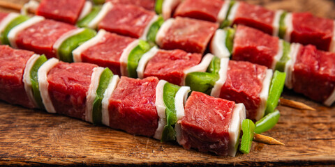 raw kebab meat and vegetables pork, lard, pepper, vegetable dish fresh delicious gourmet food background on the table rustic food top view copy space