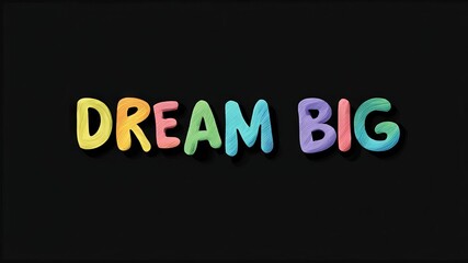 Motivational phrase “Dream big” on a black background written in cheerful colorful letters